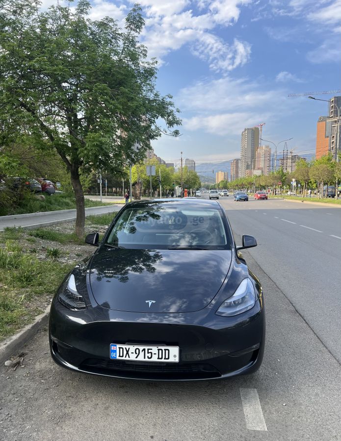 Tesla Model Y - фото 11
