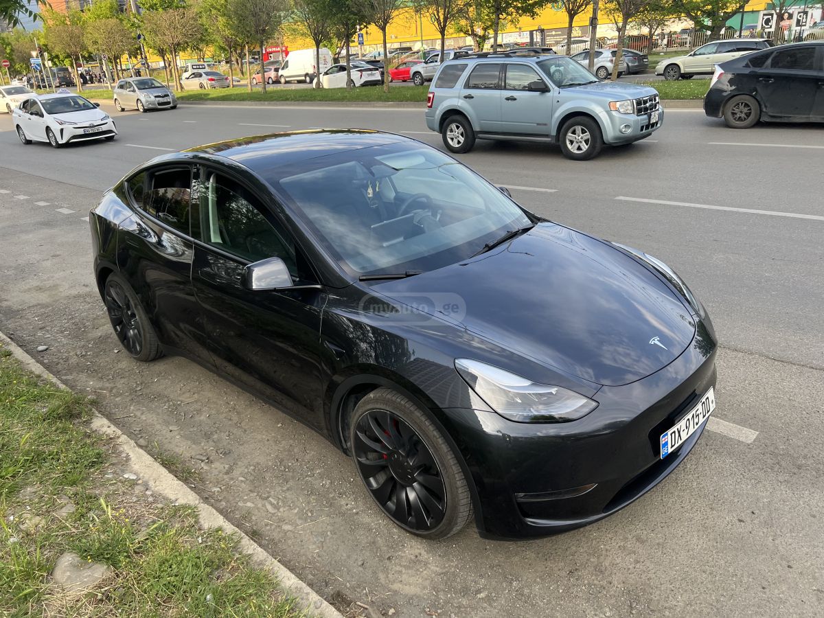 Tesla Model Y - фото 2
