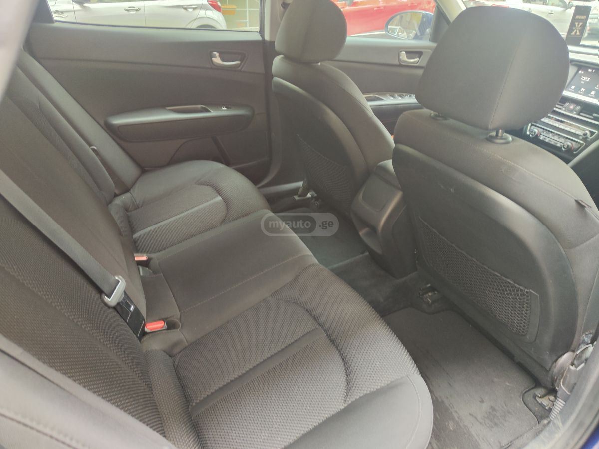 Kia Optima - фото 11