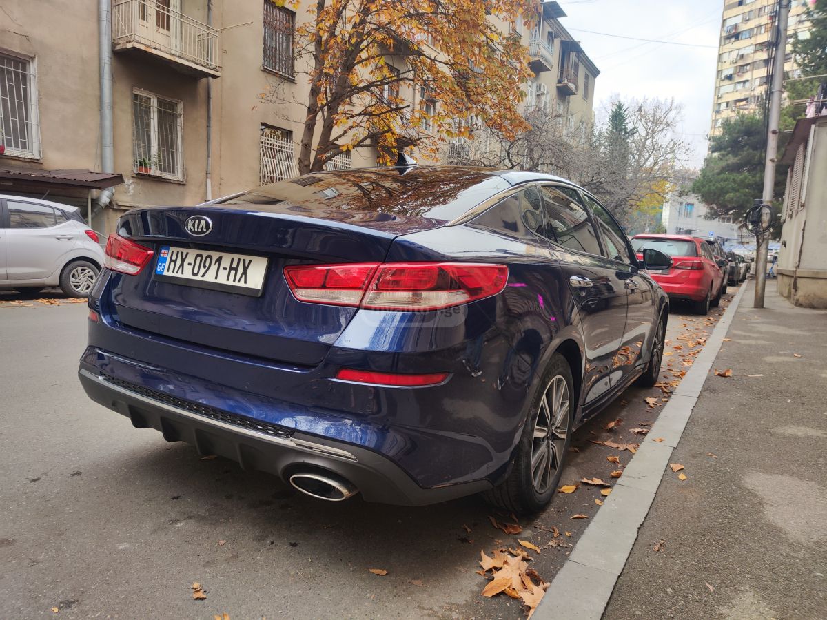 Kia Optima - фото 4
