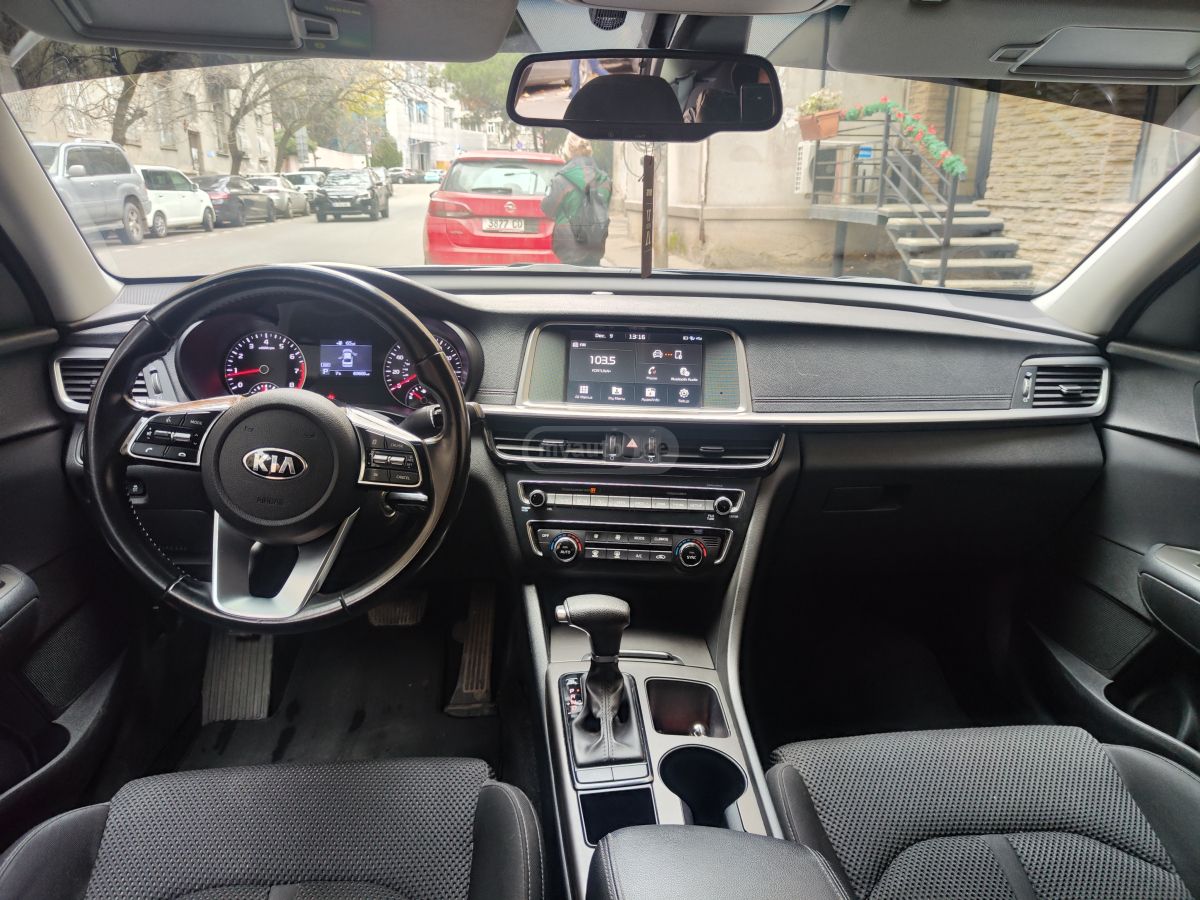 Kia Optima - фото 6