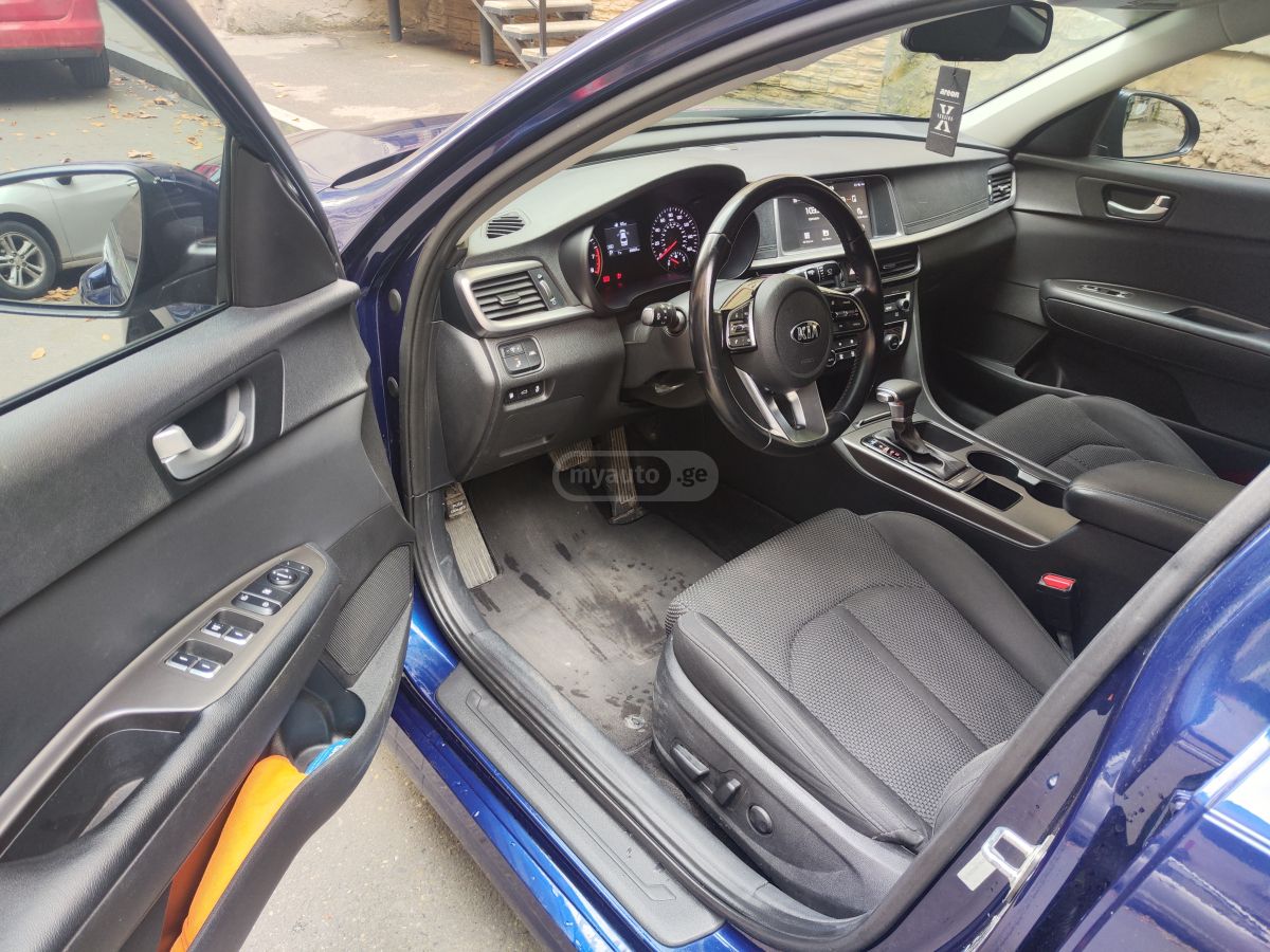Kia Optima - фото 7