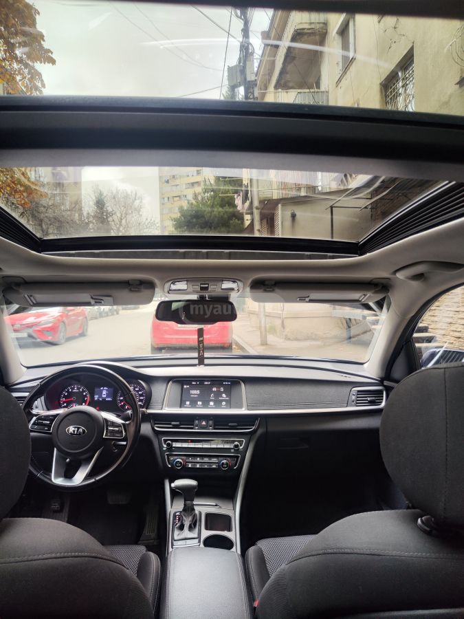 Kia Optima - фото 8