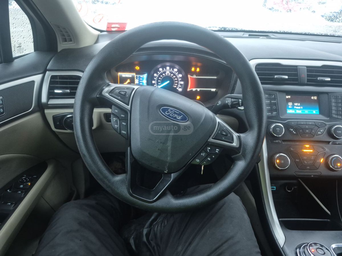 Ford Fusion - фото 12