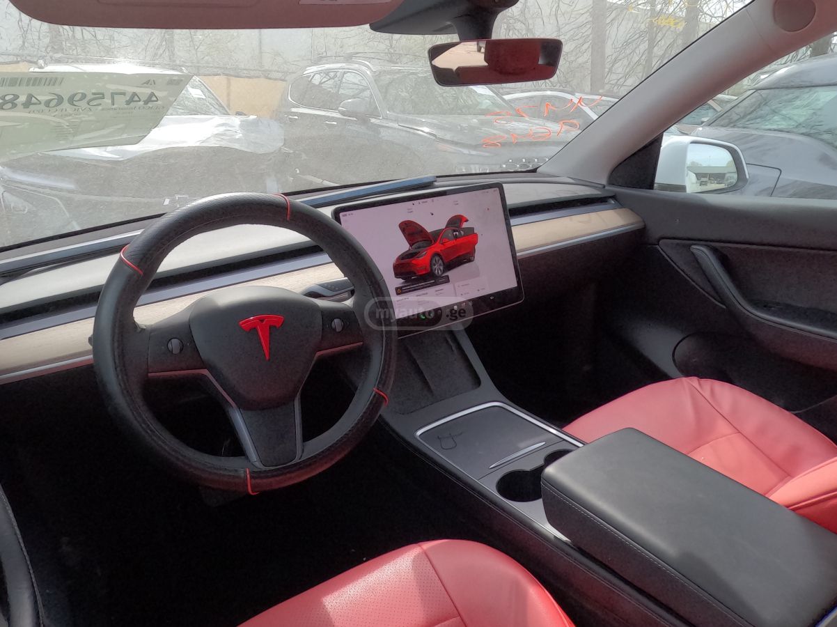 Tesla Model Y - фото 11