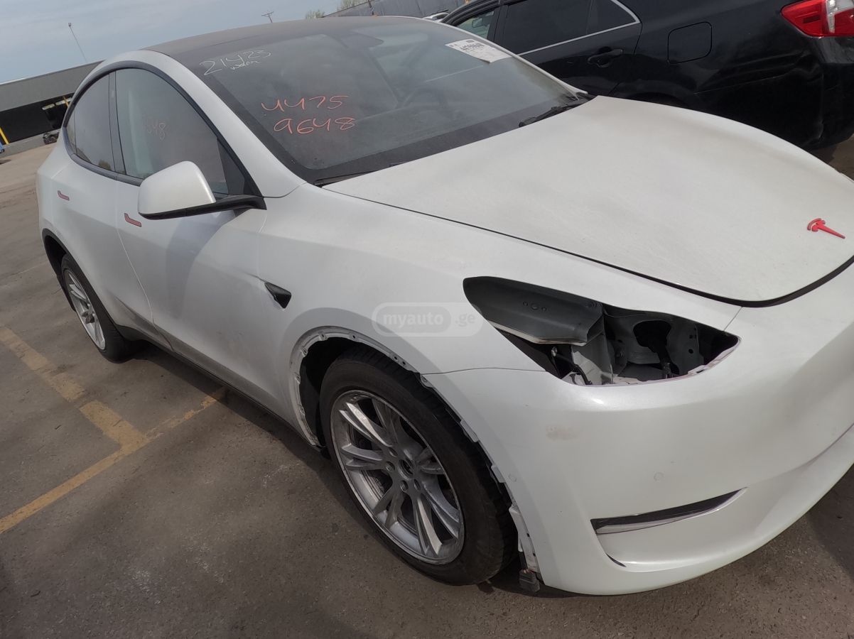 Tesla Model Y - фото 2