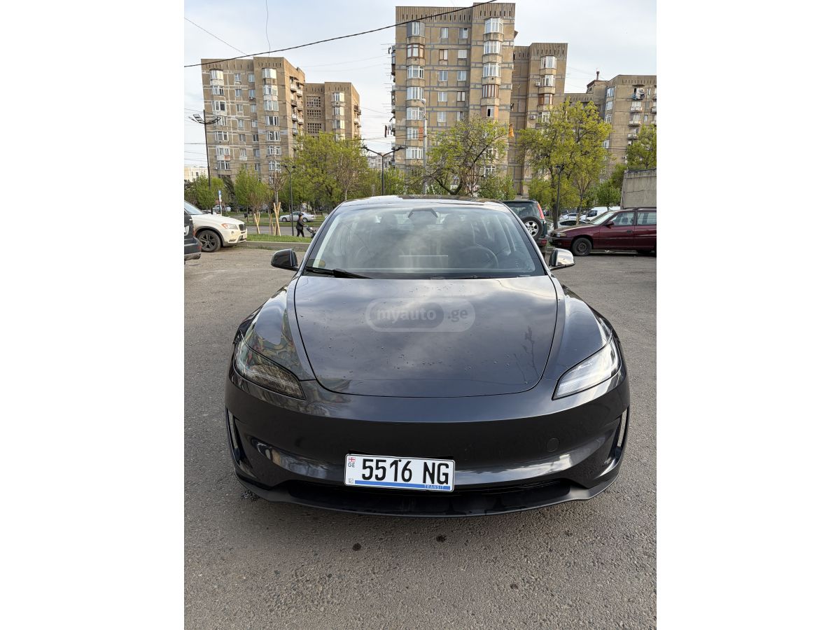 Tesla Model 3 - фото 1