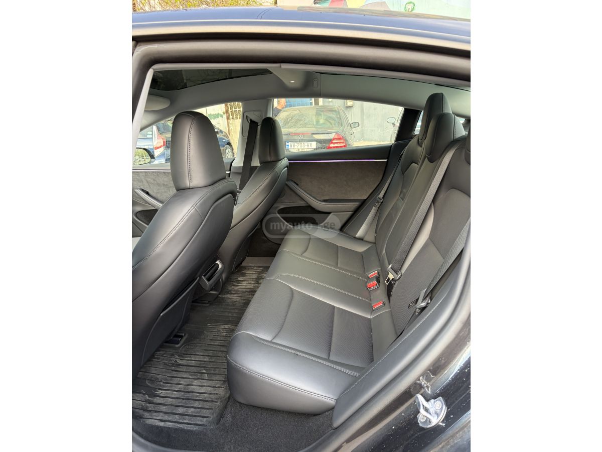 Tesla Model 3 - фото 6