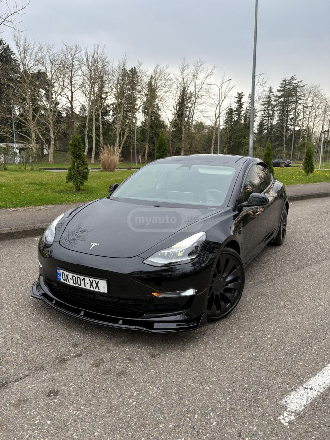 Tesla Model 3 - фото 1