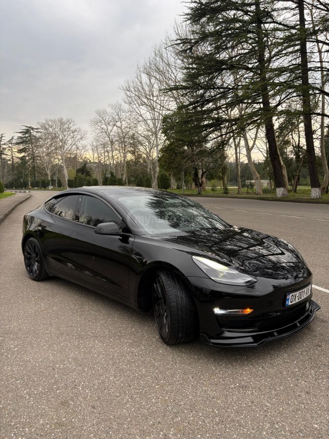 Tesla Model 3 - фото 10