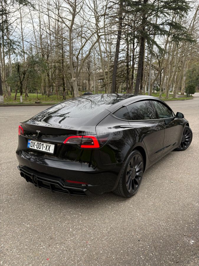 Tesla Model 3 - фото 14