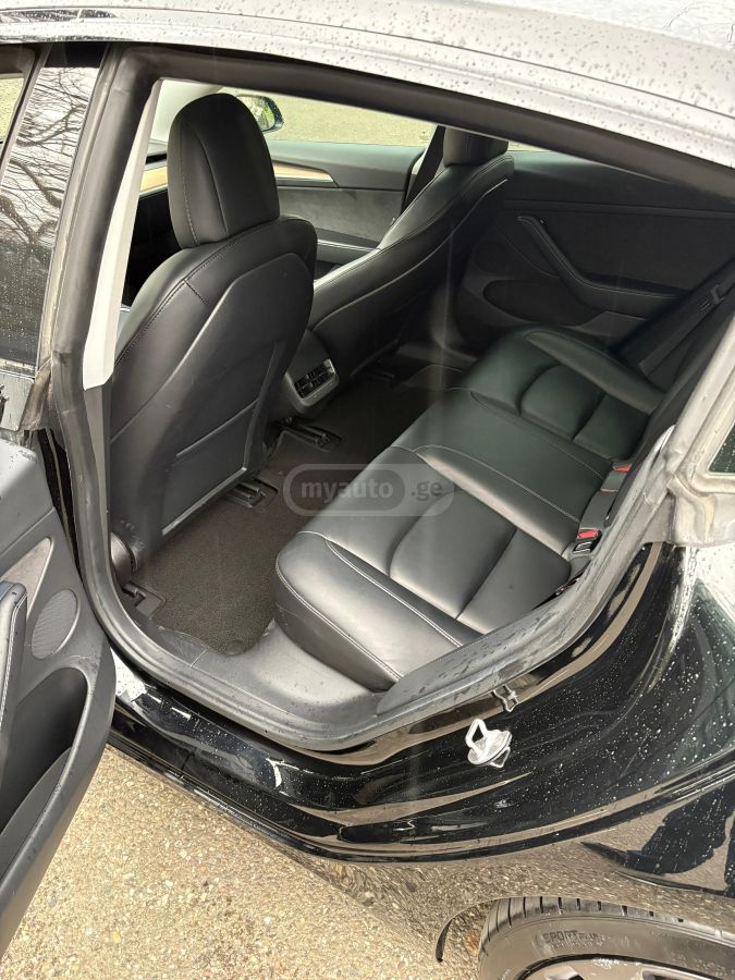 Tesla Model 3 - фото 15