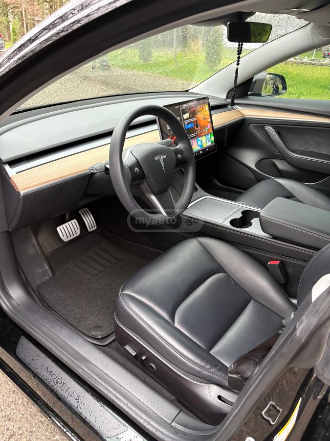 Tesla Model 3 - фото 7