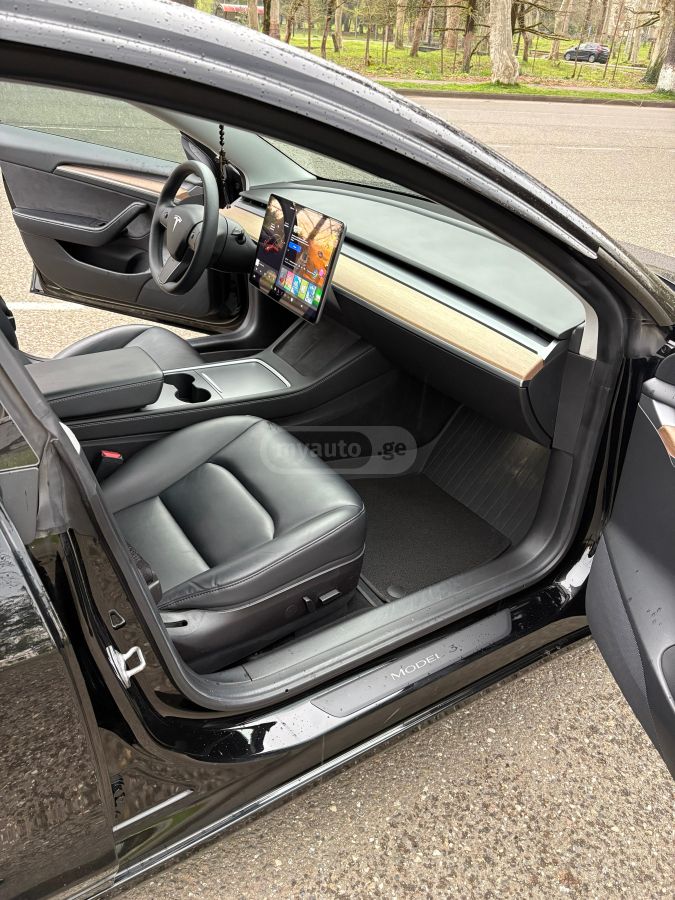 Tesla Model 3 - фото 8