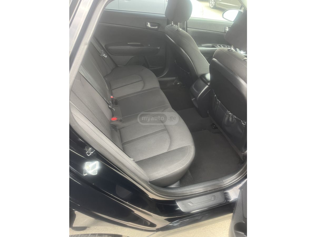 Kia Optima - фото 10