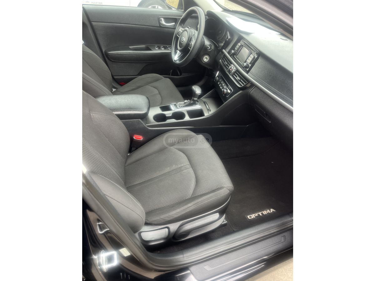 Kia Optima - фото 11