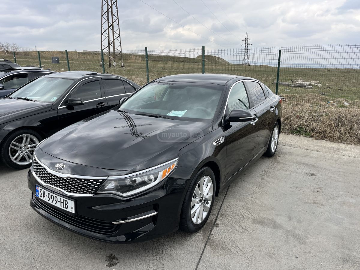 Kia Optima - фото 5
