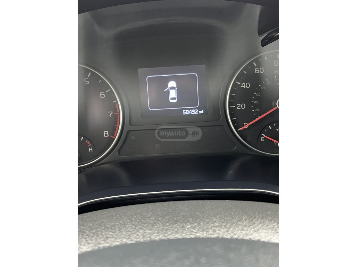 Kia Optima - фото 6