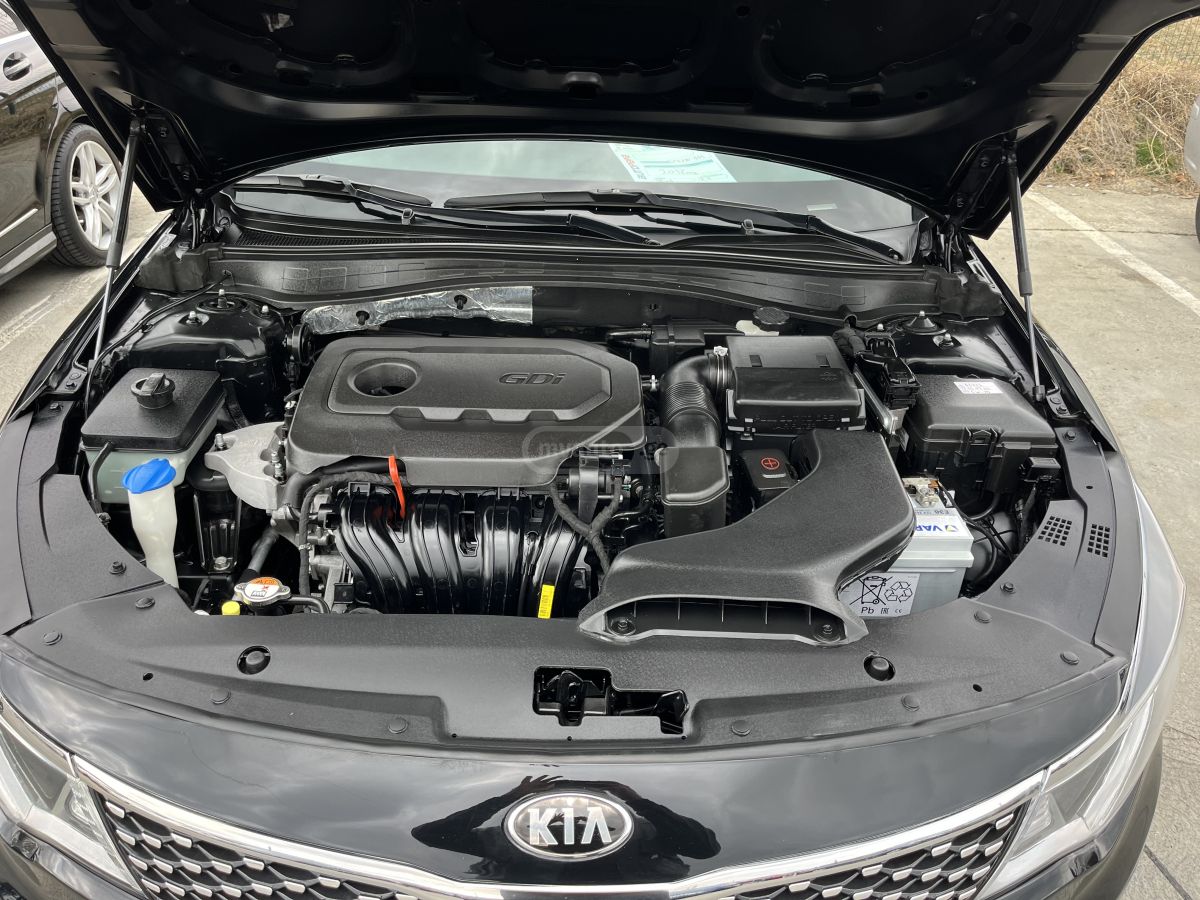 Kia Optima - фото 7