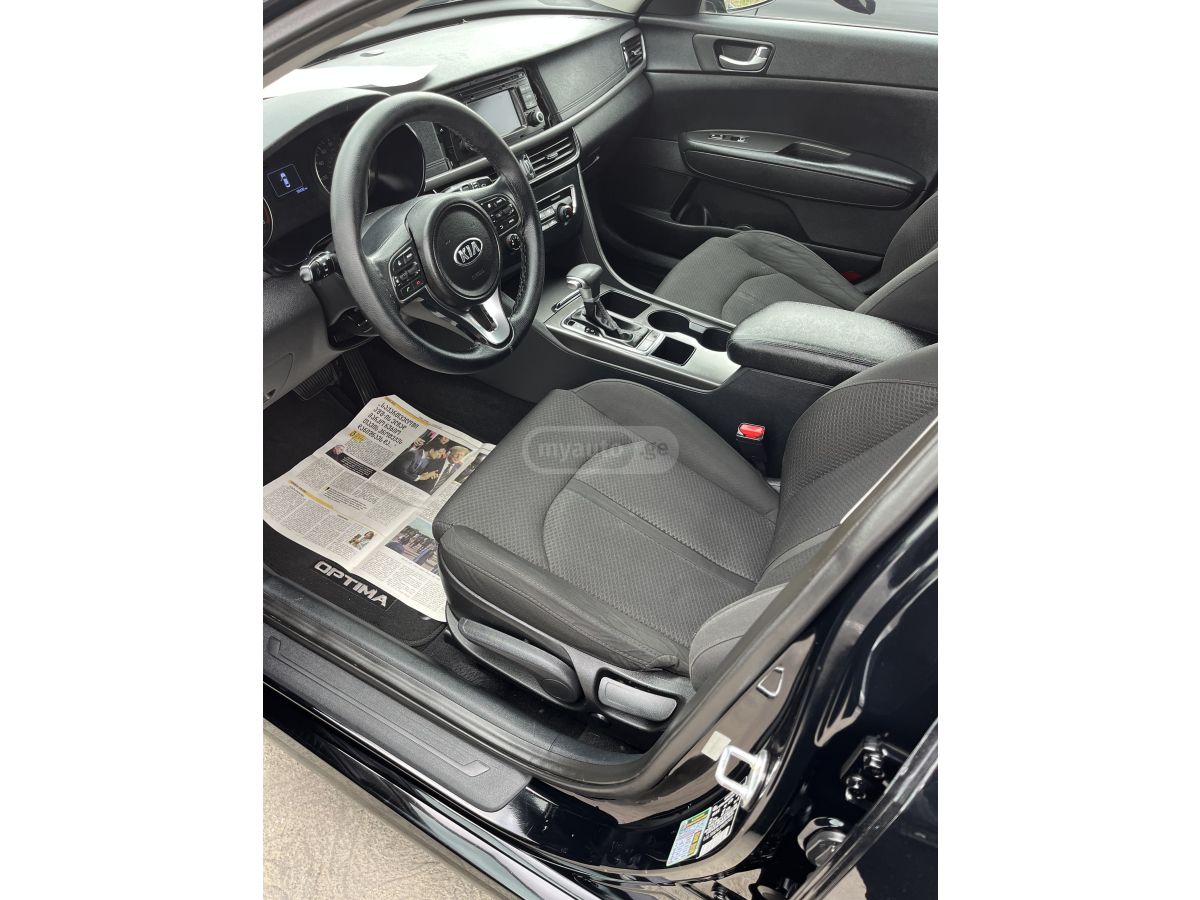 Kia Optima - фото 9