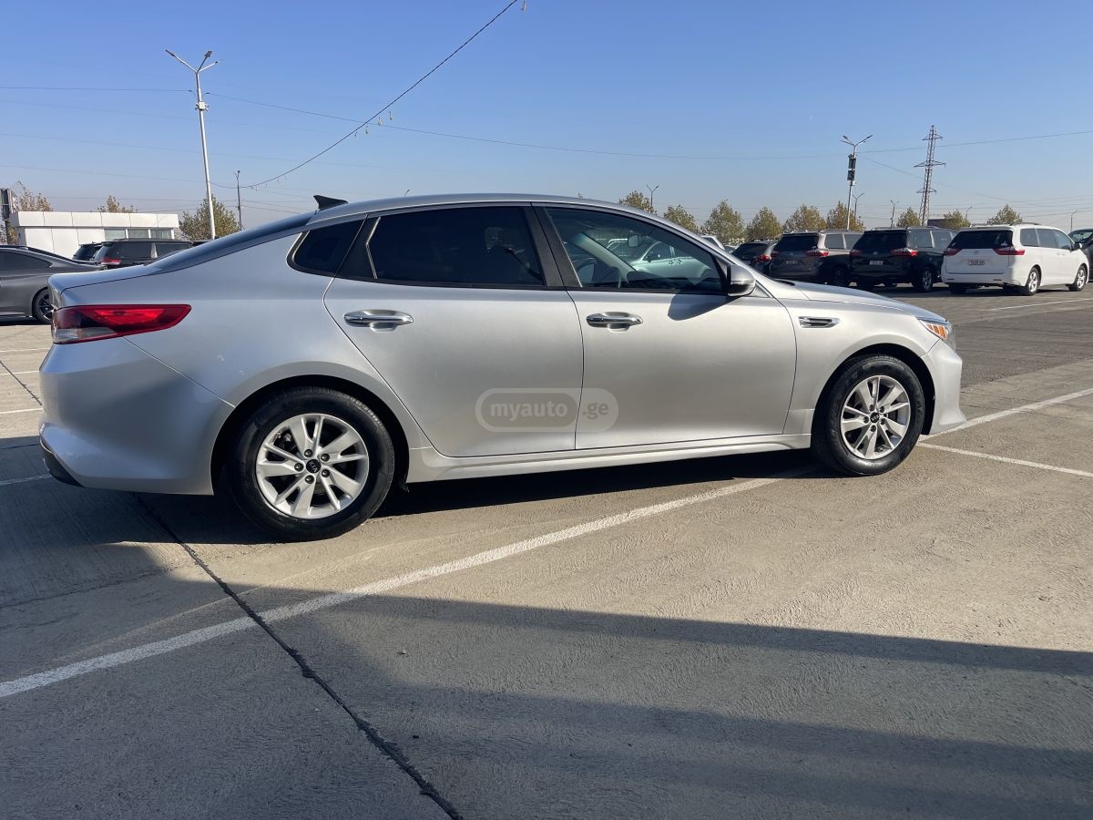 Kia Optima - фото 4