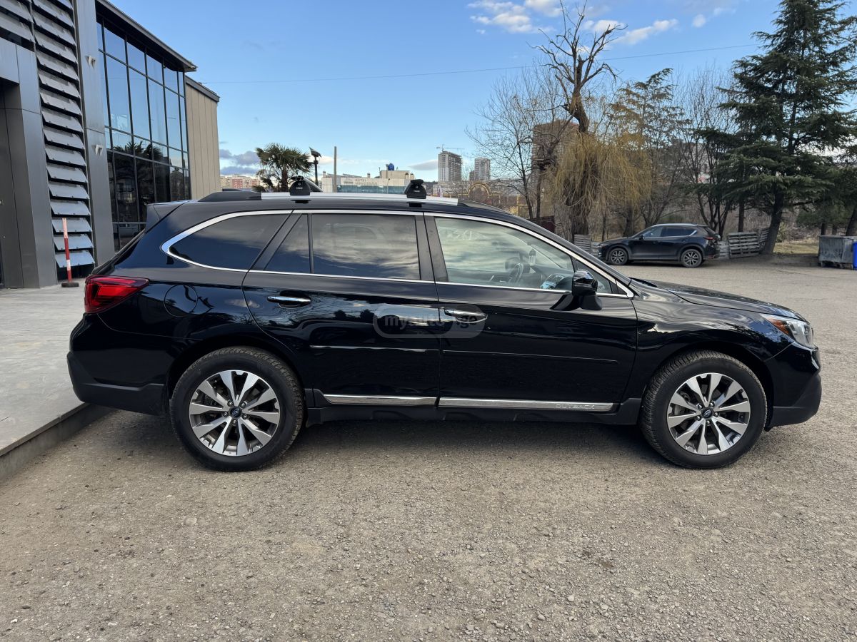 Subaru Outback - фото 5