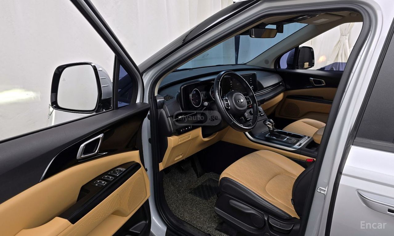Kia Carnival - фото 10