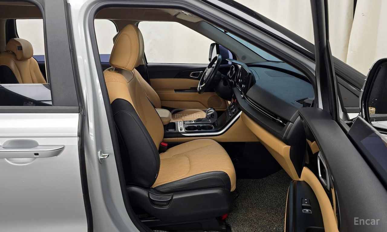Kia Carnival - фото 11