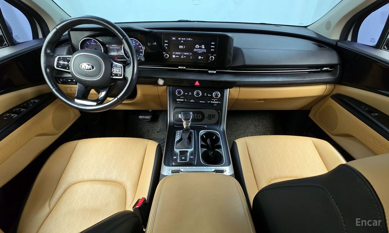 Kia Carnival - фото 7