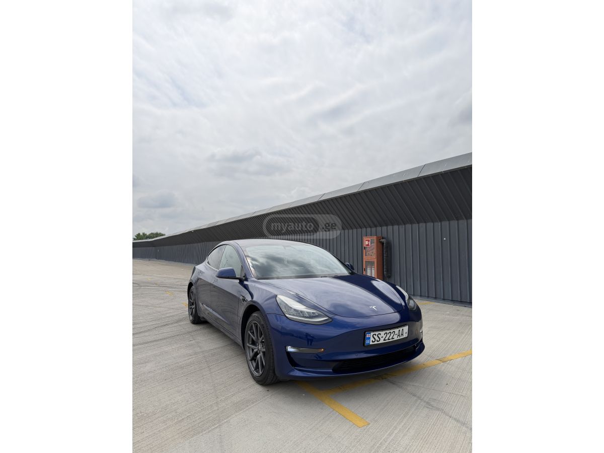 Tesla Model 3 - фото 1