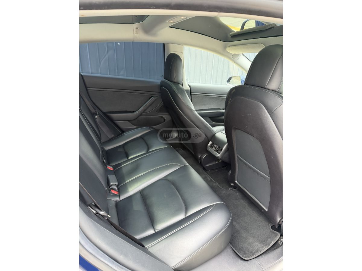 Tesla Model 3 - фото 10