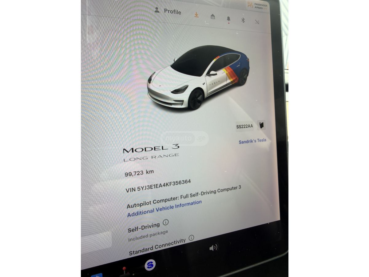 Tesla Model 3 - фото 12