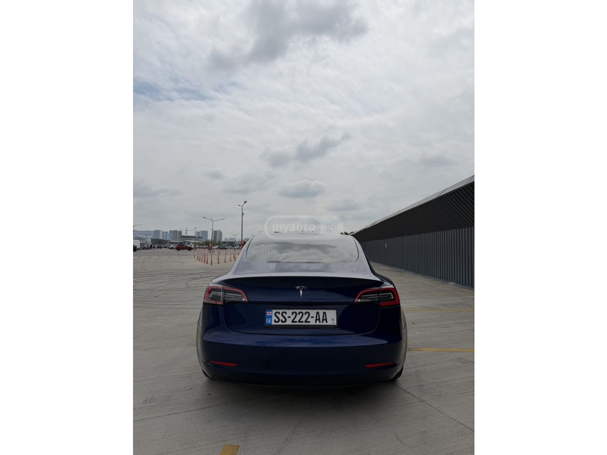 Tesla Model 3 - фото 8