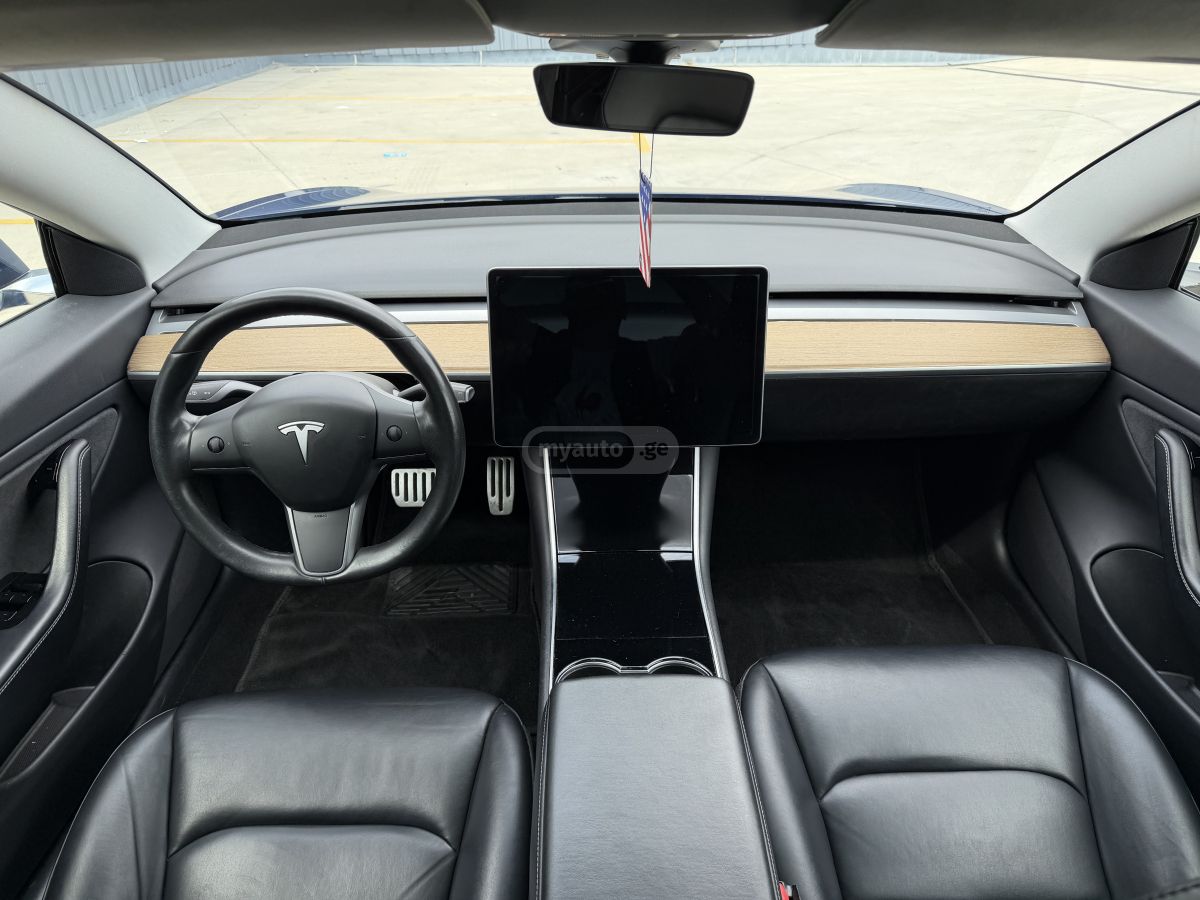 Tesla Model 3 - фото 9