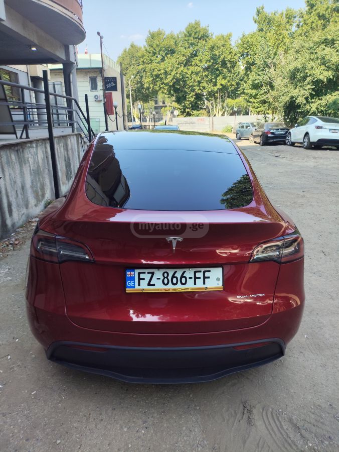 Tesla Model Y - фото 6