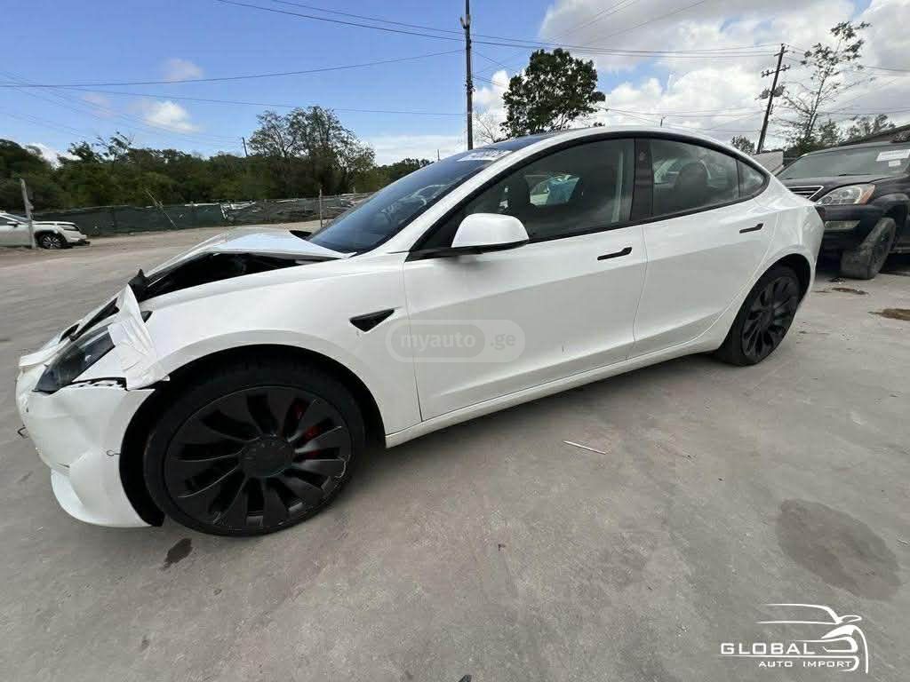 Tesla Model 3 - фото 2