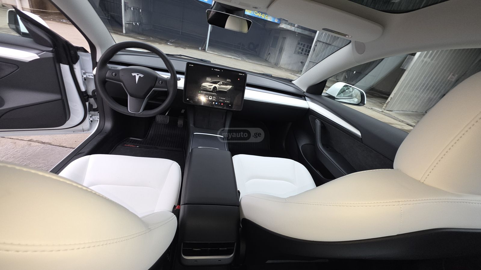 Tesla Model 3 - фото 9