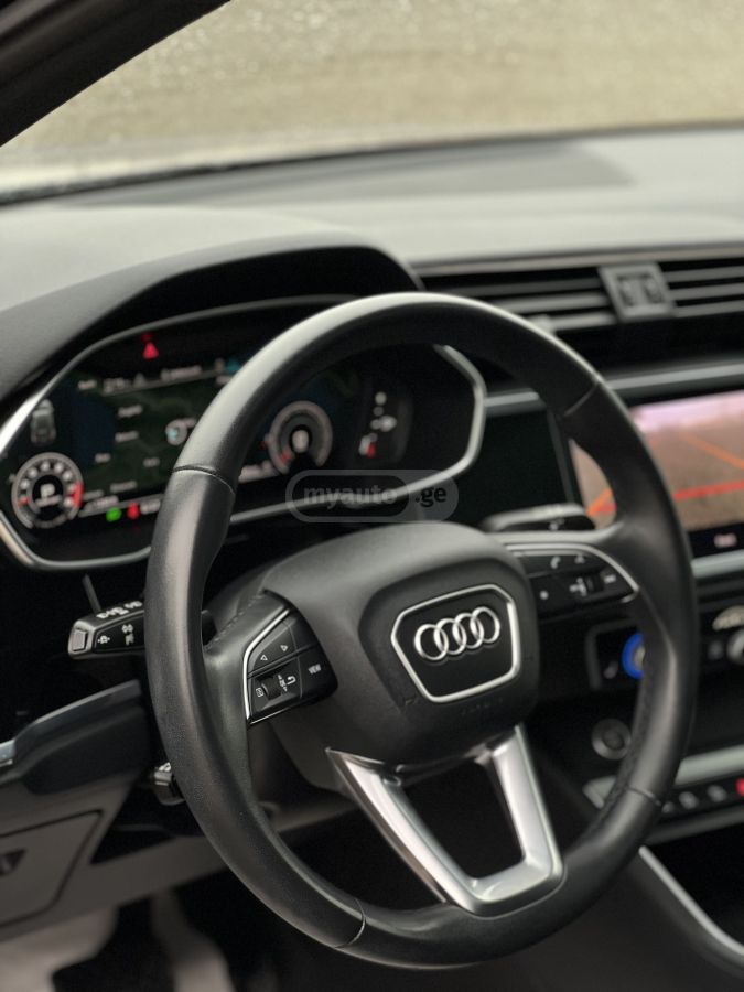 Audi Q3 - фото 10