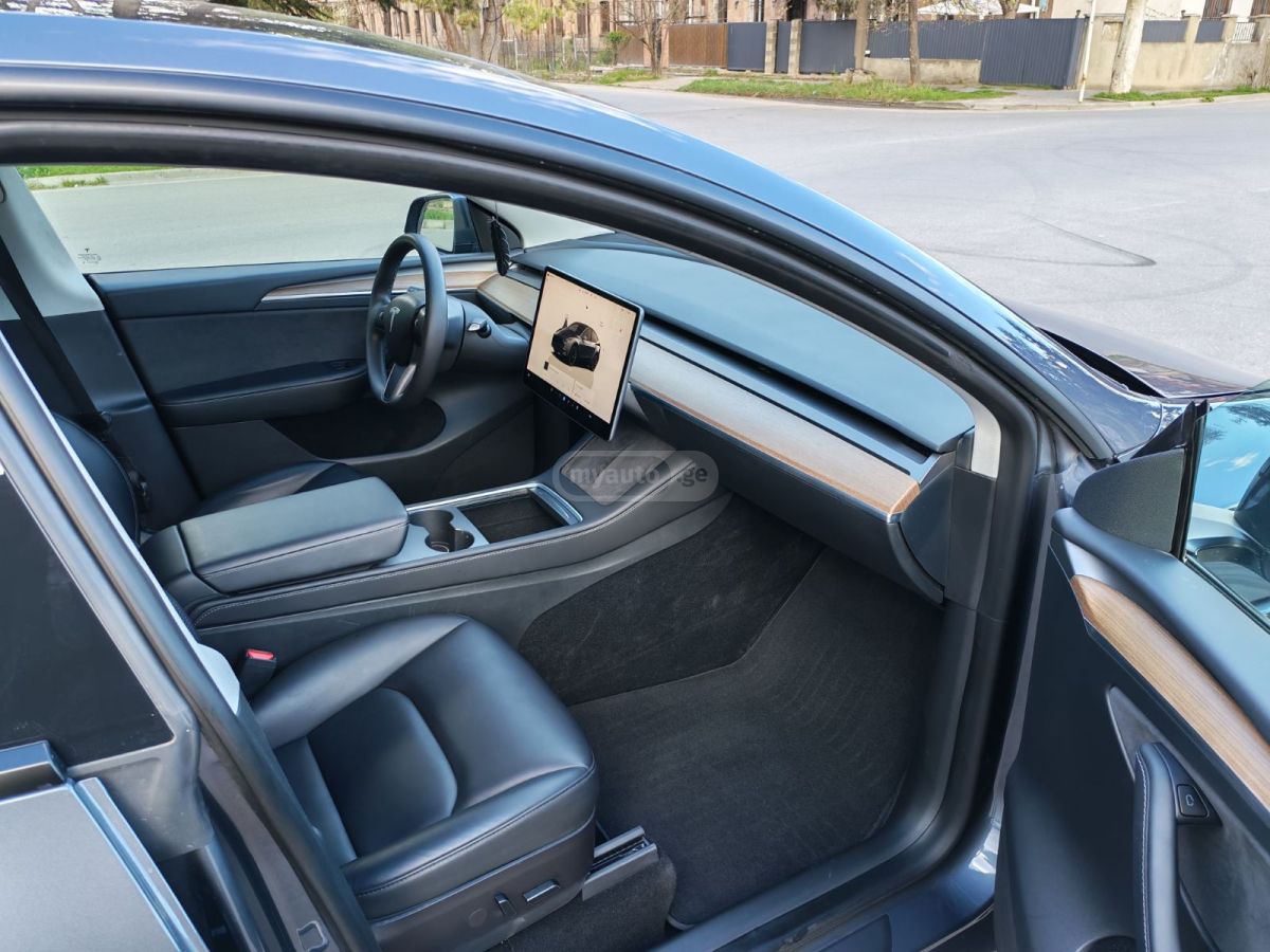 Tesla Model Y - фото 11