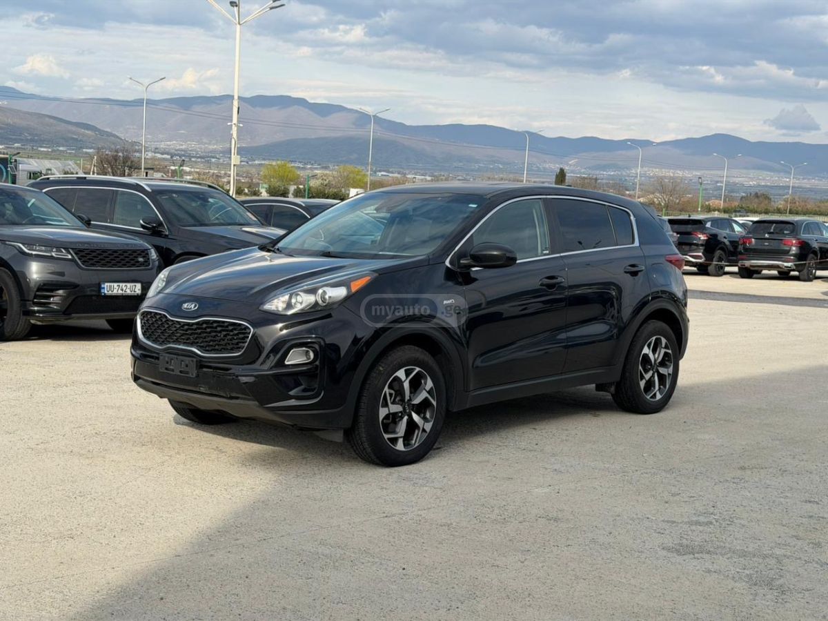 Kia Sportage - фото 1