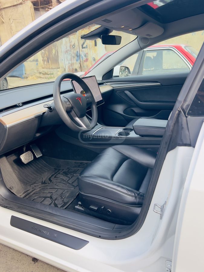 Tesla Model 3 - фото 9