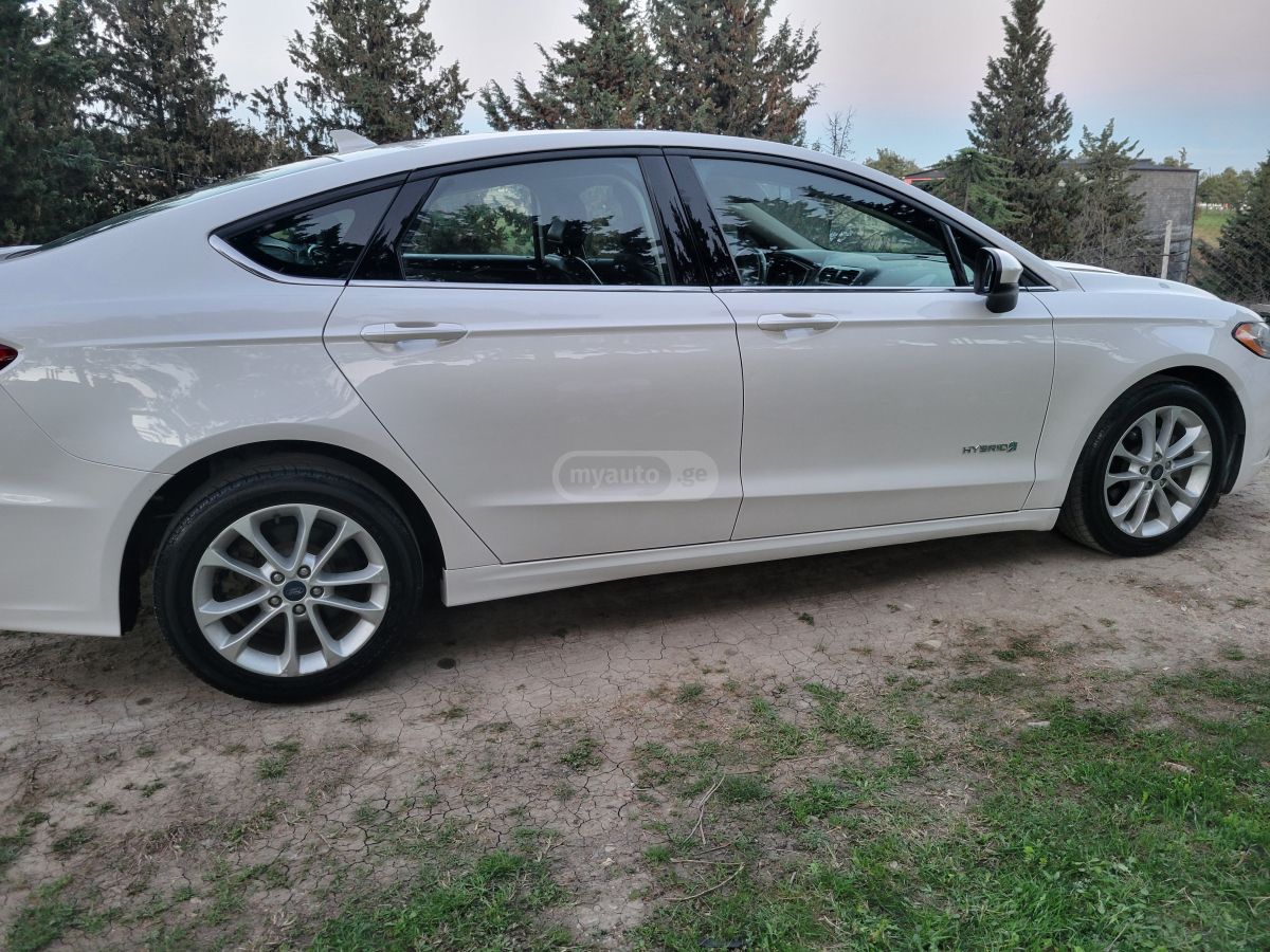 Ford Fusion - фото 5