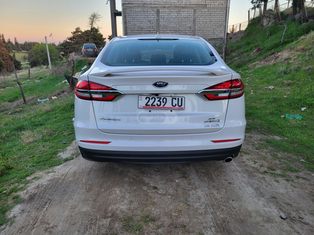 Ford Fusion - фото 8
