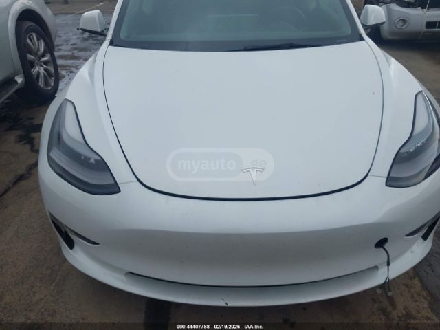 Tesla Model 3 - фото 10