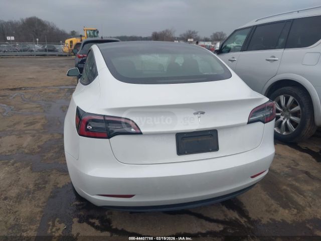 Tesla Model 3 - фото 14