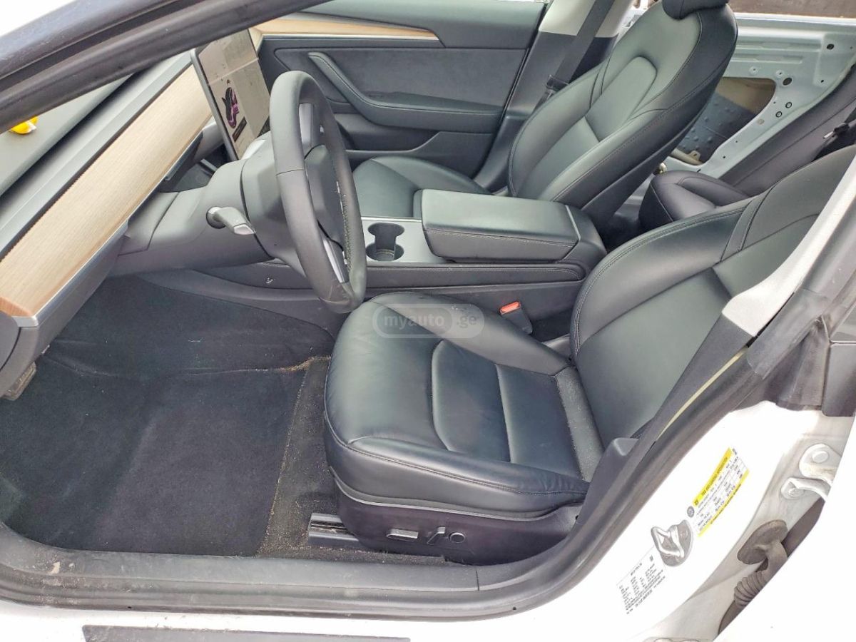 Tesla Model 3 - фото 7