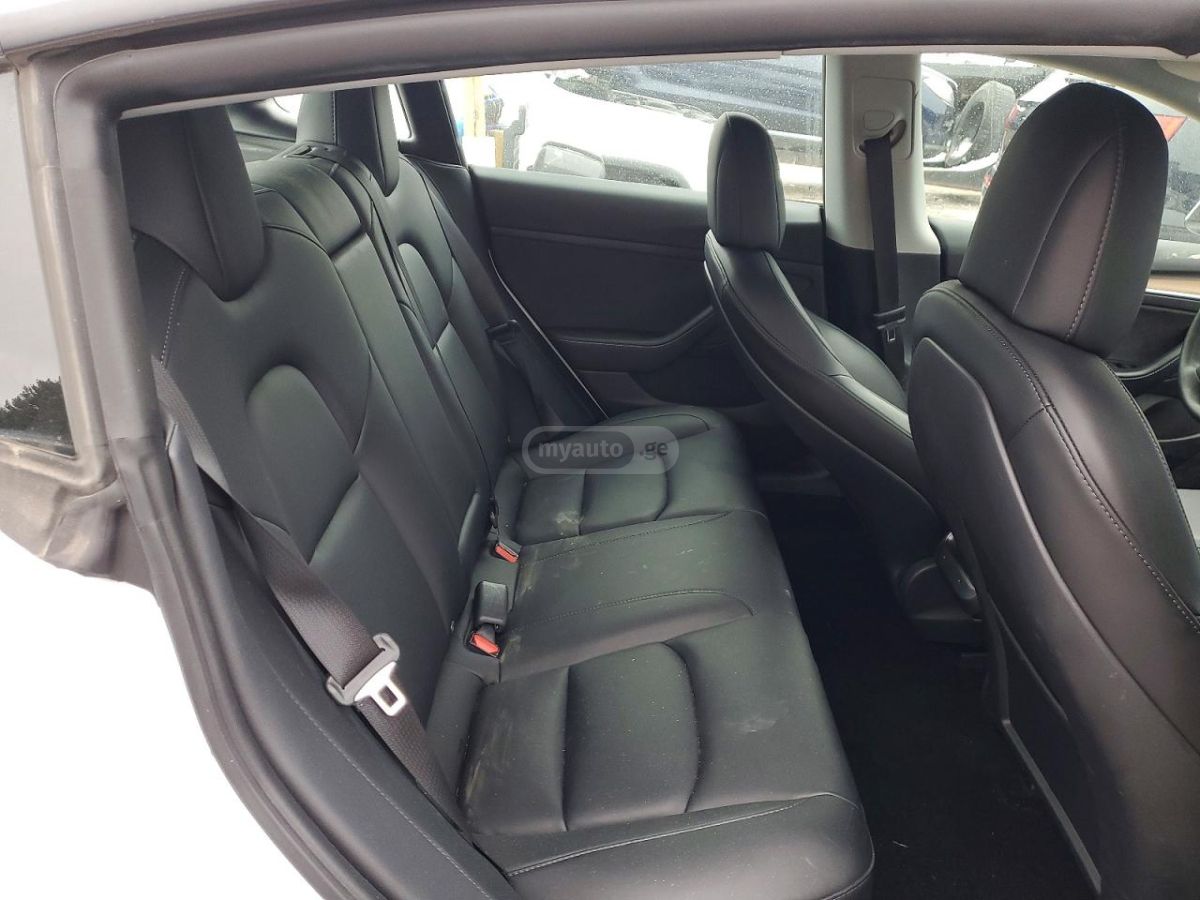Tesla Model 3 - фото 9