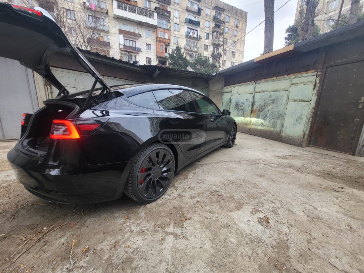 Tesla Model 3 - фото 5