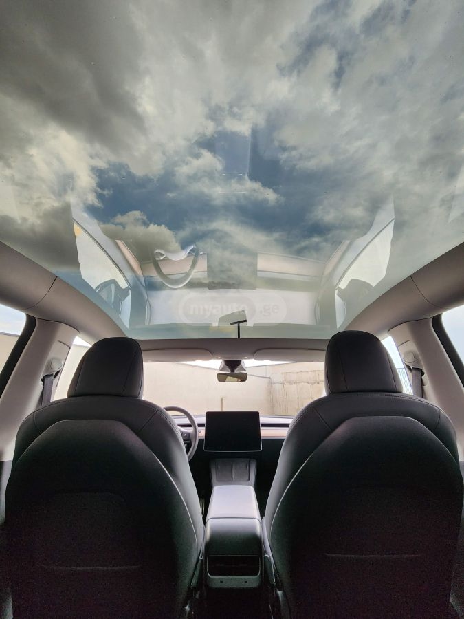 Tesla Model Y - фото 11