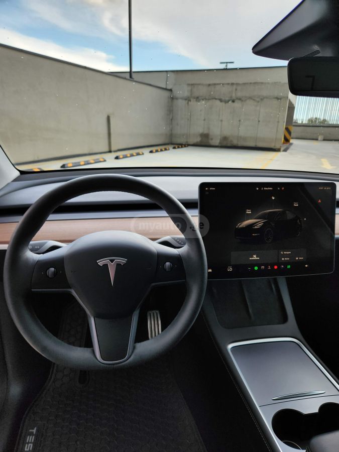 Tesla Model Y - фото 12